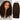 Model wearing Ali Grace #4 Chocolate Brown Burmese Curly protective style crochet 100% human hair extensions, featuring feather-soft curls, natural volume, and a seamless everyday look.