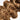 Ali Grace #4/27 Highlight Body Wave Crochet 100% Human Hair Extension displayed with soft flowing body waves, dimensional highlight color, reusable knot-friendly strands and premium human hair for natural-looking boho braids.