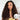 Model wearing Ali Grace Chocolate Brown Water Wave Crochet 100% Human Hair Extension with soft natural waves, rich chocolate brown color, reusable texture and a natural-looking finish for boho braids.