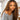 Ali Grace #4/27 Highlight Kinky Curly Human Hair Crochet Extension on model showing natural curl texture, voluminous style, soft feel and seamless blending